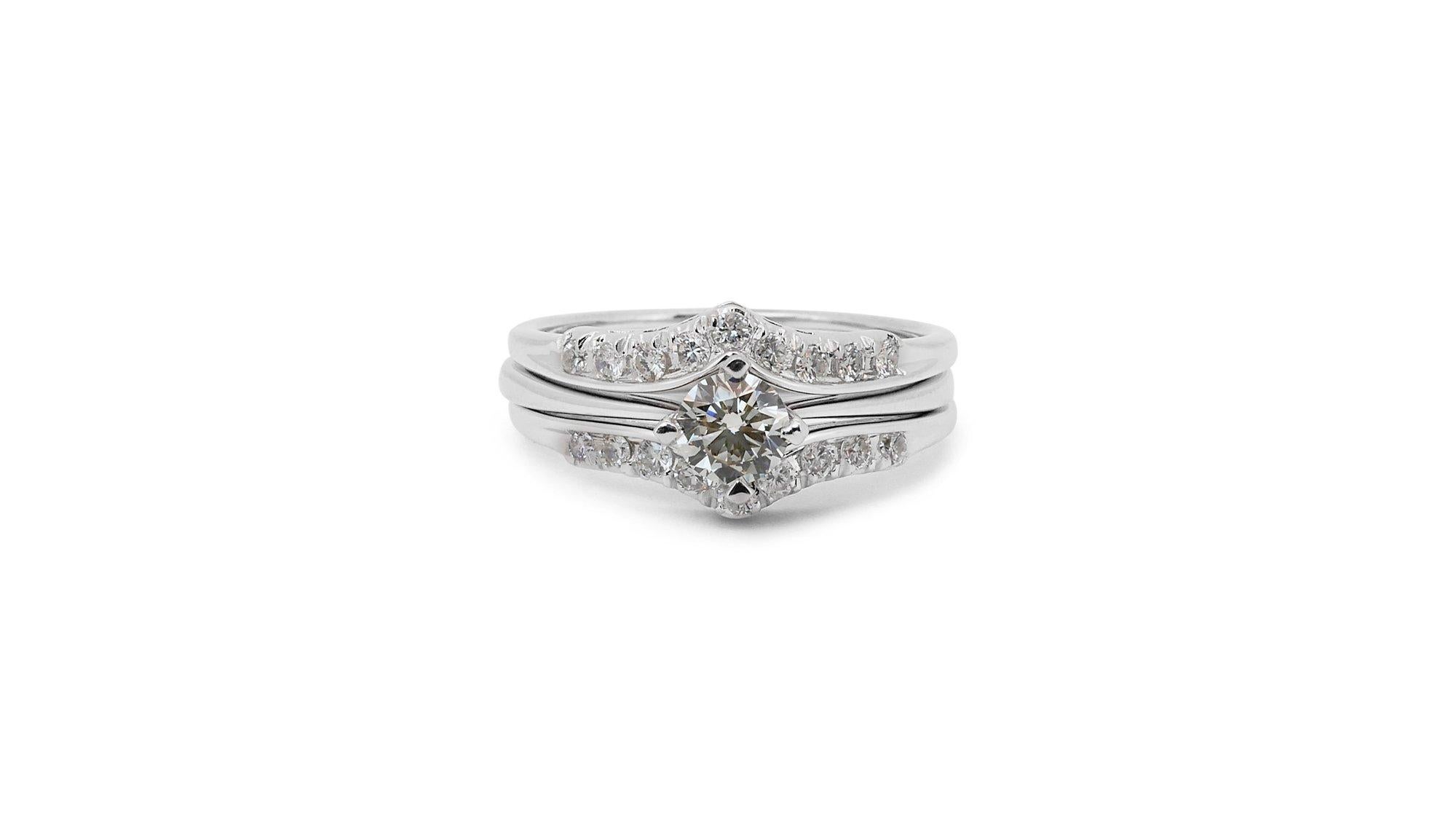 A gorgeous solitaire ring with extra matching with a dazzling 0.4 carat round brilliant natural diamond. It has 0.36 carat of side diamonds which add more to its elegance. The jewelry is made of 18K White Gold with a high quality polish. It comes