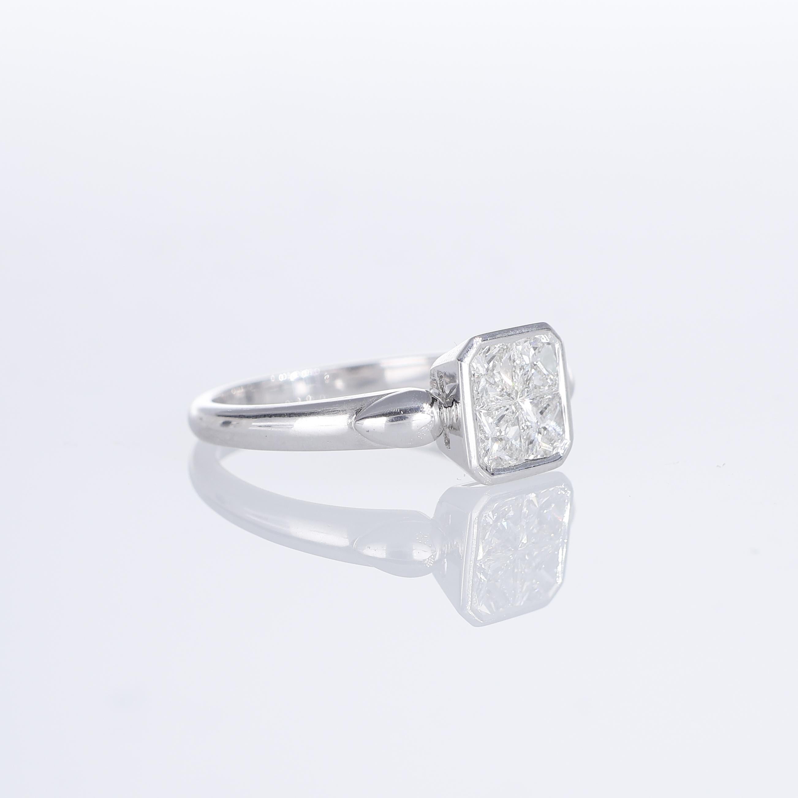 Brilliant Cut 18K White Gold Solitaire Ring with Princess-Cut Diamonds For Sale