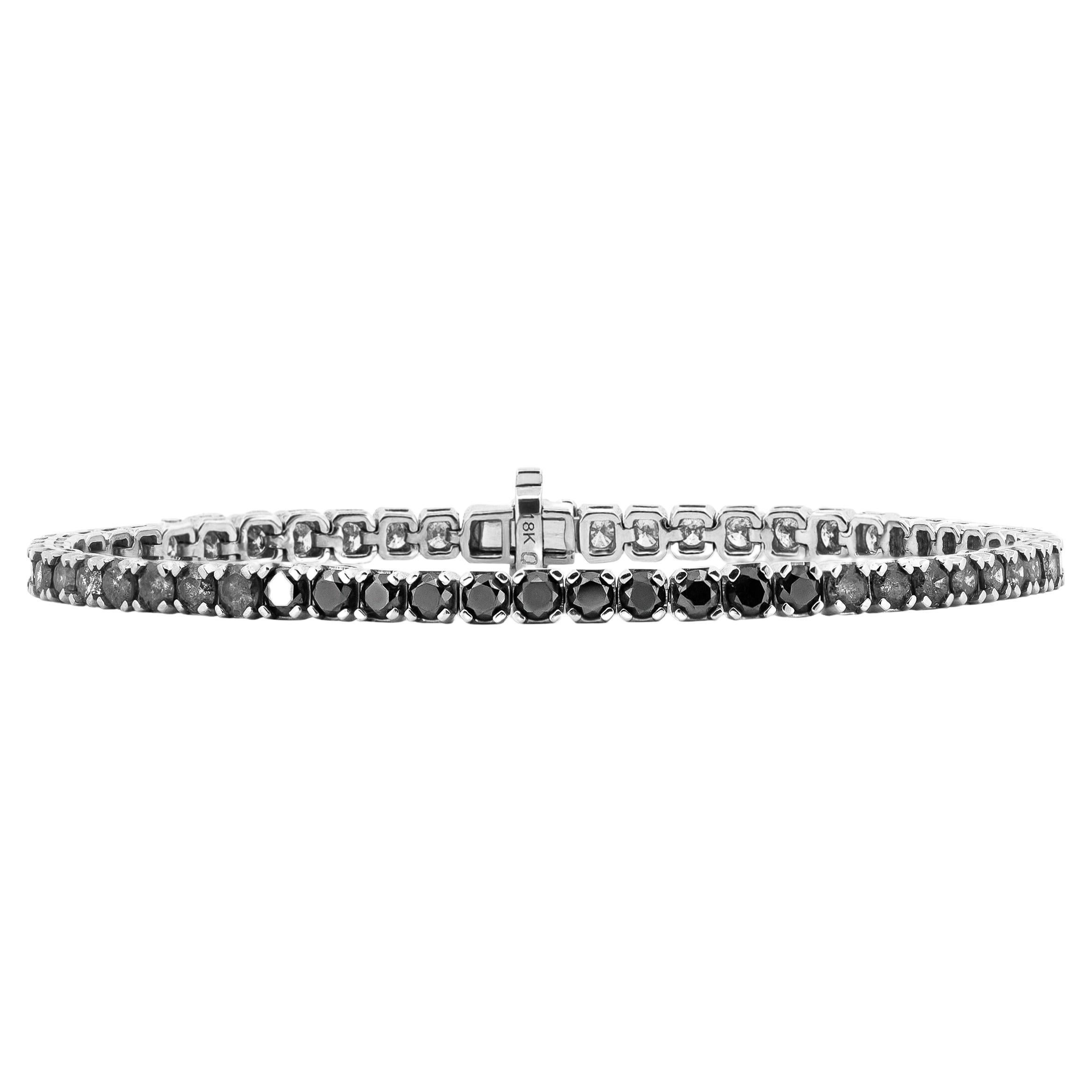 The Process Spectrum Tennis Bracelet is 18k White Gold with 10 pt White, Salt & Pepper, Black Gradient diamonds with a hidden box clasp closure. 

Width: 3.5mm wide

Please note the possibility of natural inclusions in gemstones

Made in the USA
