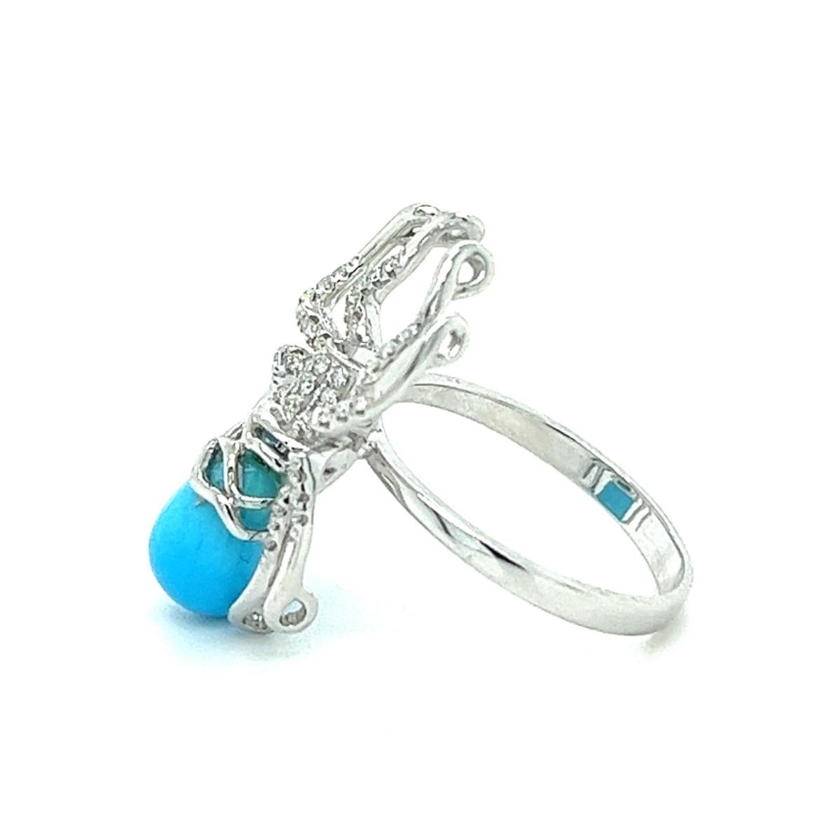 18K White Gold Spider Ring with
Diamonds & Turquoise
56 Diamonds - 0.24 CT 
1 Turquoise - 3.17 CT 
18K White Gold - 4.62 GM

Indulge in the enchanting beauty of the Spider Ring, a symbol of strength and grace. Let the turquoise gemstone captivate