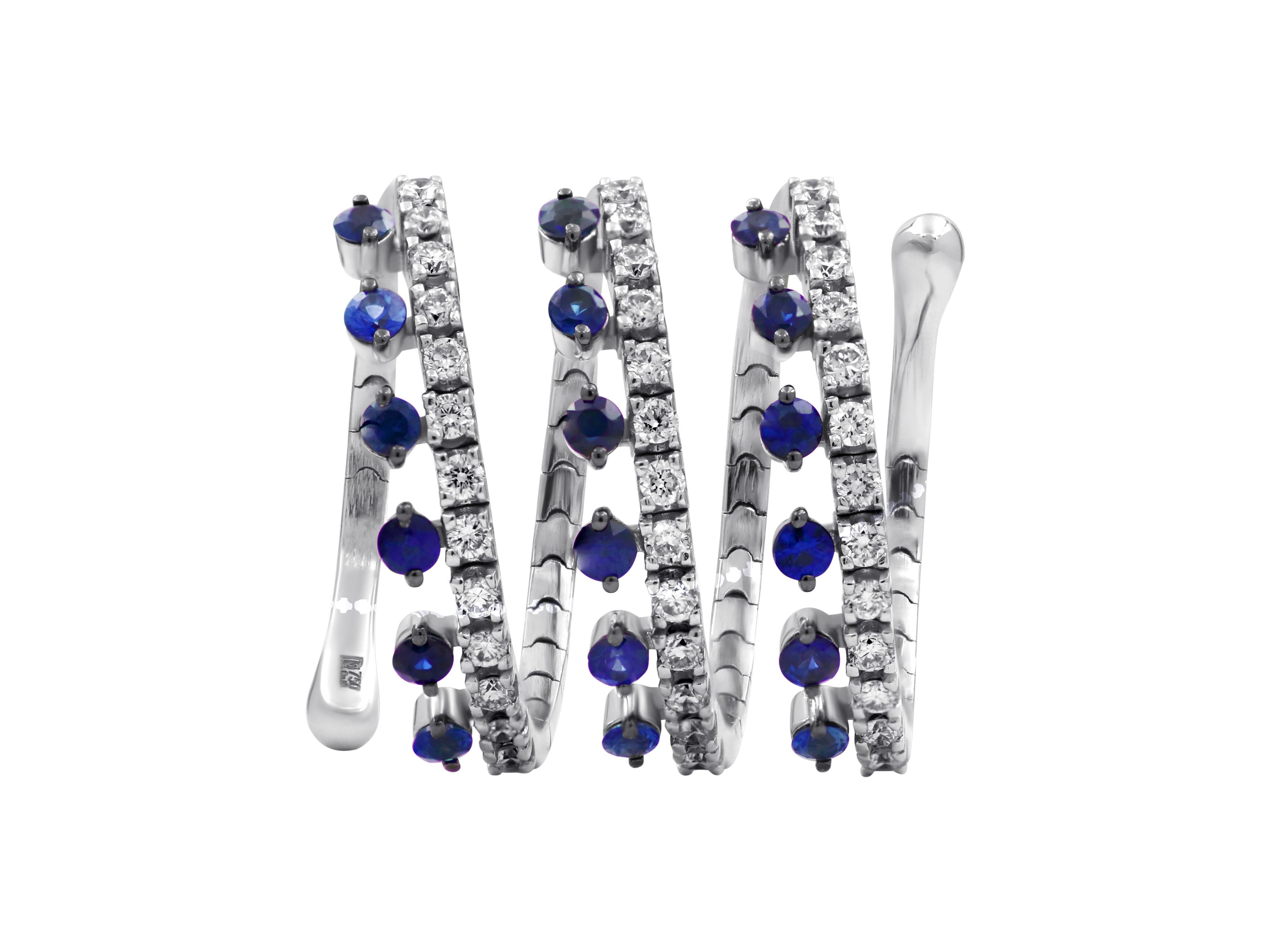 Flexible 18k white gold spiral ring with 0.74 carats blue sapphires and 0.49 carats brilliant cut diamonds

Length: 0.669”, 1.7cm
Width: Adjustable 