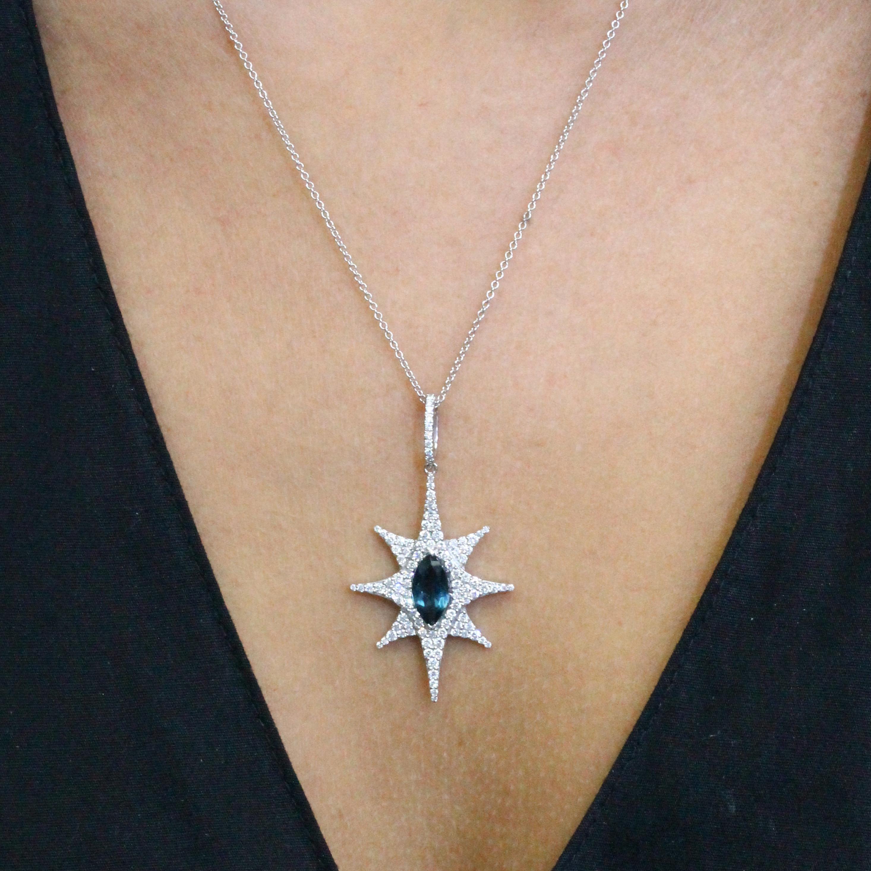 18K White Gold Star Necklace featuring Marquise, prong-set London Blue Topaz, and Diamond Pave, hanging on an 18-inch 18K Cable Chain, with 16-inch adjuster ring. One-of-a-kind necklace. Item ref. P8089LBT-1.

♦ Behind the Stone ♦
- London Blue