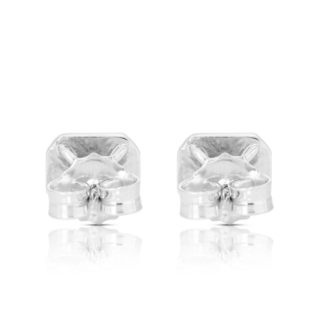 18K White Gold Stud Earrings with 0.93ct Emerald Cut Diamonds For Sale 3
