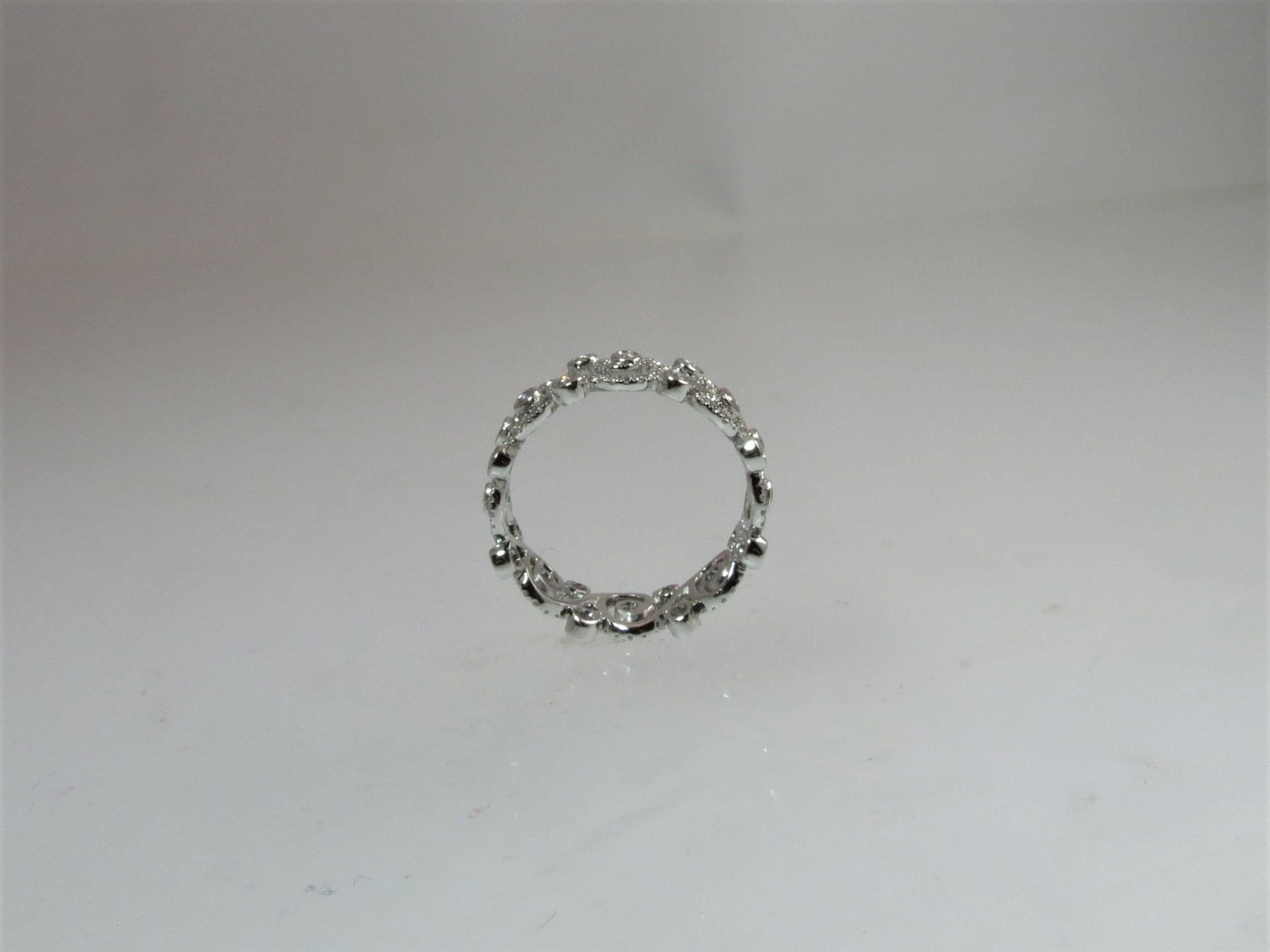 Round Cut 18 Karat White Gold Swirl Design Diamond Eternity Band Ring