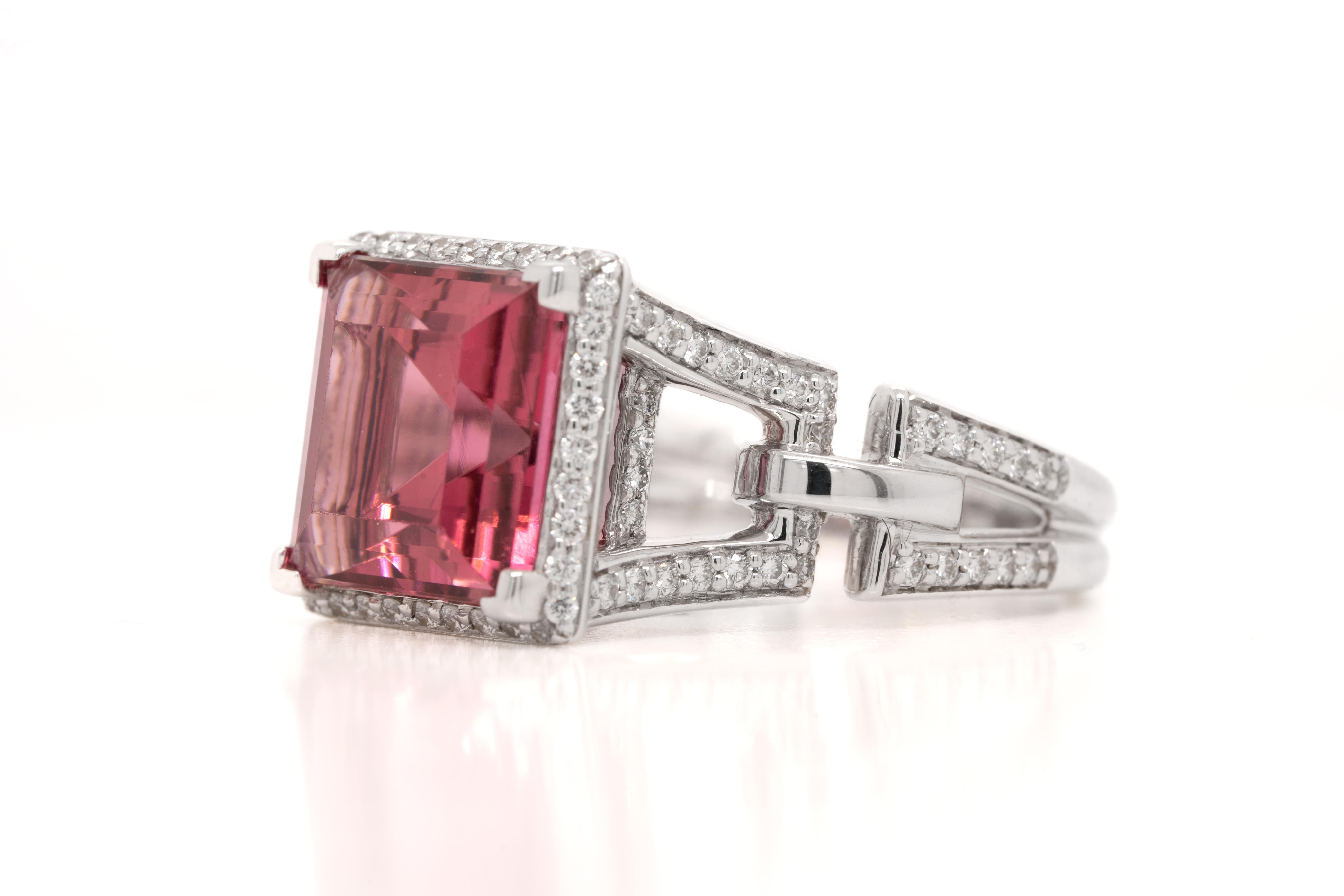 Tamir Designer engagement ring includes one squared vibrant pink tourmaline that is filled with brilliance. The unique design on the band is flushed with round brilliant cut diamonds that are flashing with life set in 18 karat white gold! This is a