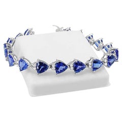 18K White Gold Tanzanite and Diamond Bracelet. Style# BR8017