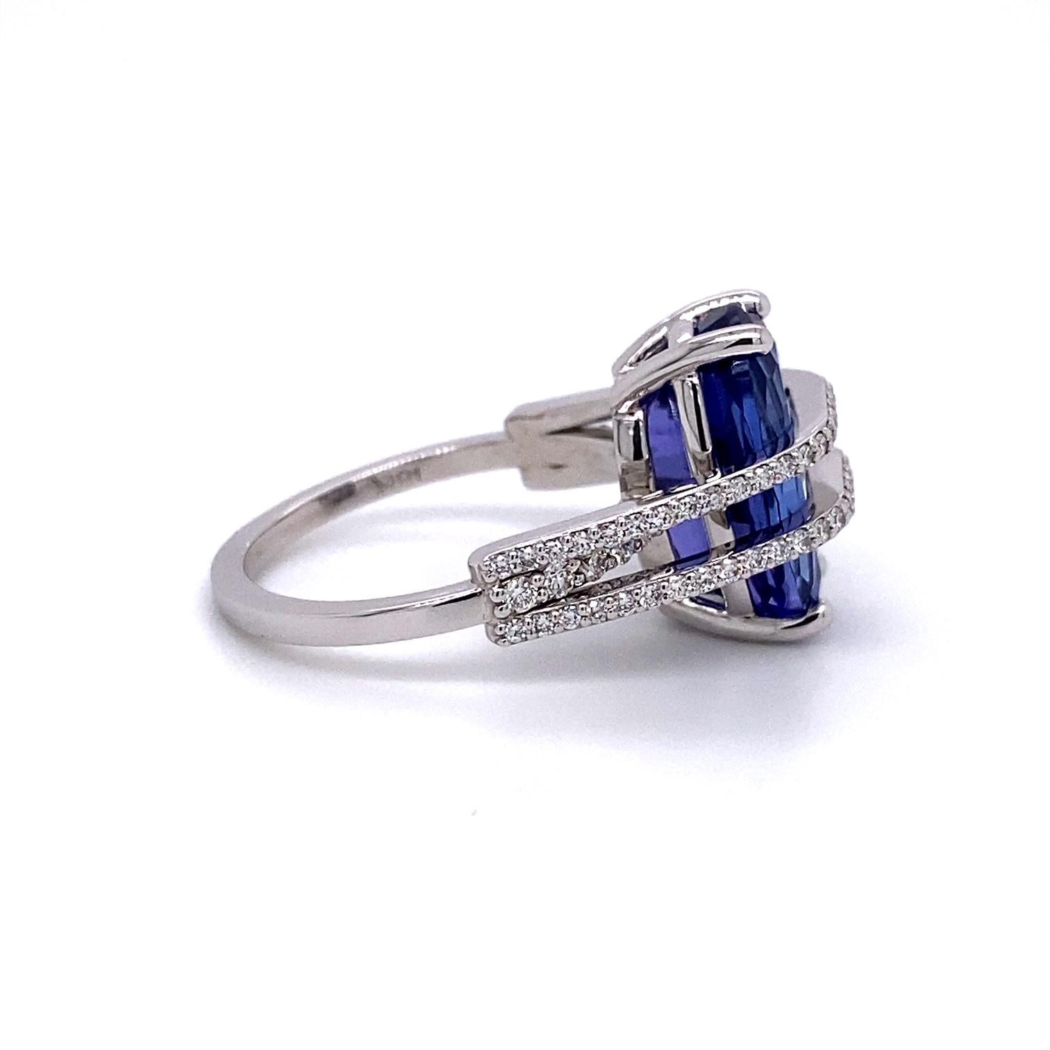 Contemporary 18 Karat White Gold Tanzanite and Diamond Ring