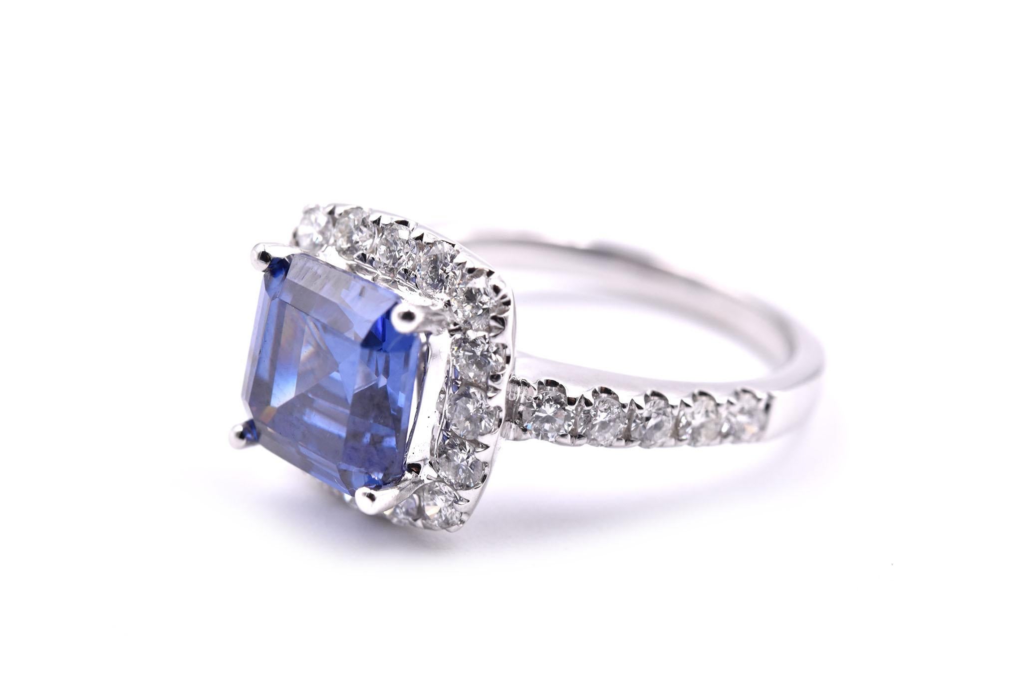 Round Cut 18 Karat White Gold Tanzanite and Diamond Ring