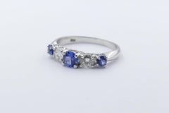 18 Karat White Gold Tanzanite and Diamond Eternity/Dress Ring