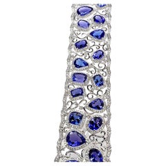 Bracelet tennis large en or blanc 18 carats avec tanzanite et diamants