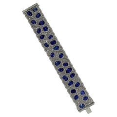 Bracelet tennis large en or blanc 18 carats avec tanzanite et diamants