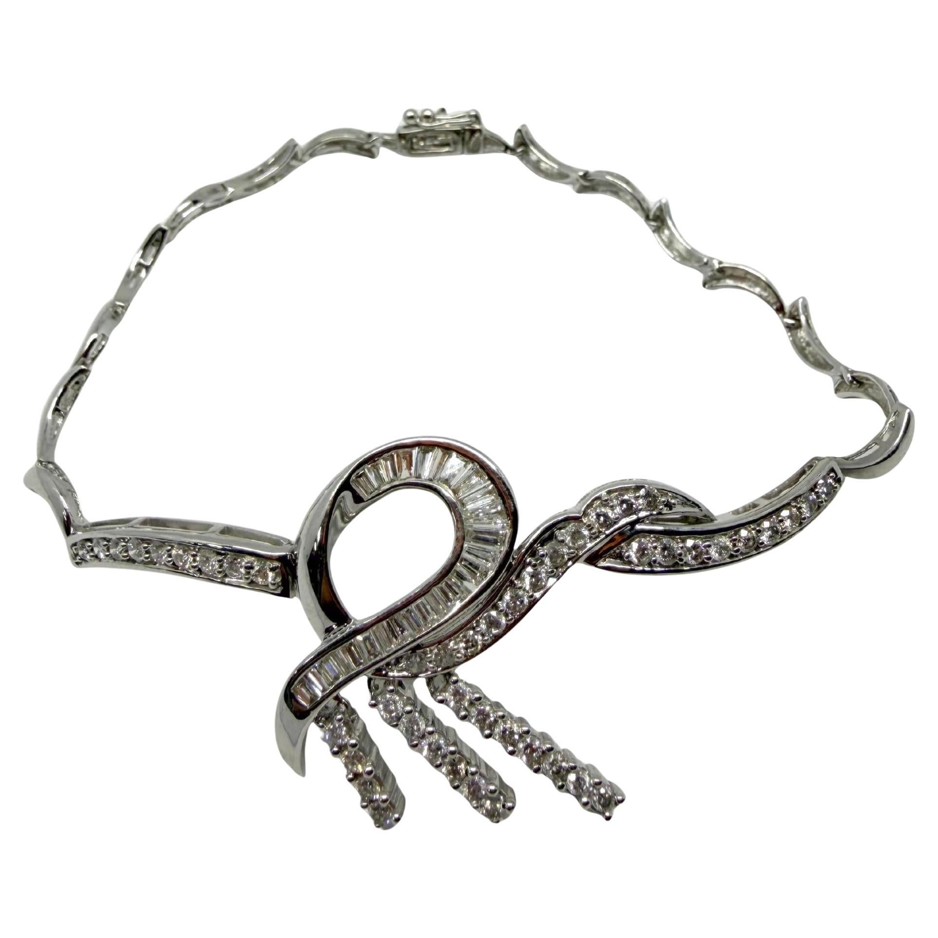 18k White Gold Tapered Baguette Cut Diamond Bow/Ribbon Bracelet For Sale