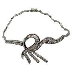 18k White Gold Tapered Baguette Cut Diamond Bow/Ribbon Bracelet 18k White Gold Tapered Baguette Cut Diamond Bow/Ribbon Bracelet