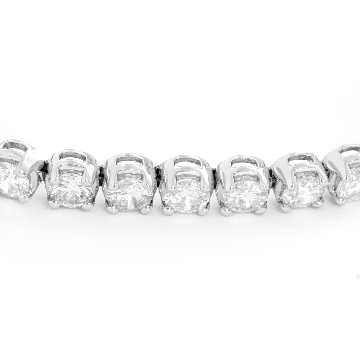 18K White gold Tennis Bracelet 12.09 cts - Crafted in 18K White gold with  30 round brilliant cut  diamonds weighing 12.09 cts.  Color G-H  - Clarity SI2-SI3. Truly stunning and one of a kind.  7 inches long. Total grams 21.2.