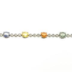 Contemporary 18 Karat White Gold Diamond (F/G VVS) and Sapphire Tennis Bracelet