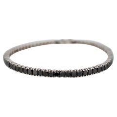 Bracelet tennis en or blanc 18 carats avec diamants noirs naturels