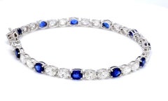 18K White Gold Tennis Bracelet with Natural Blue Sapphire and Oval Diamonds