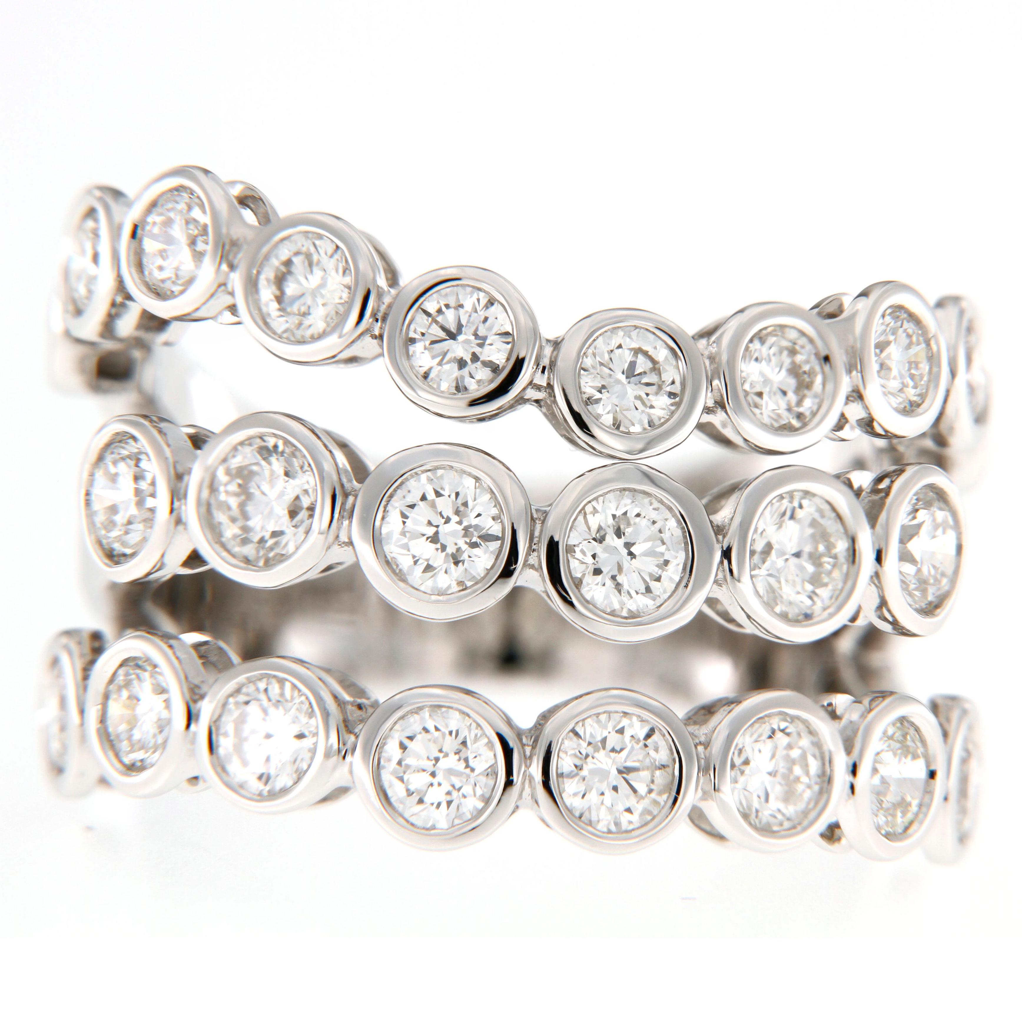 18K White Gold Three-Row Bezel Set Diamond Ring

A refined statement of elegance, this three-row diamond ring is crafted in luminous 18K white gold. Each sparkling diamond is securely framed in a smooth bezel setting, creating a clean and