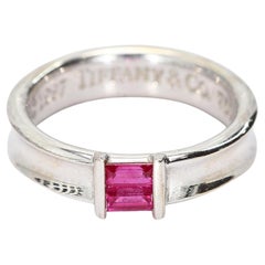 18k White Gold Tiffany
Co. Band with Two Channel Set Lab-Grown Ruby Baguettes 18k White Gold Tiffany
Co. Band with Two Channel Set Lab-Grown Ruby Baguettes