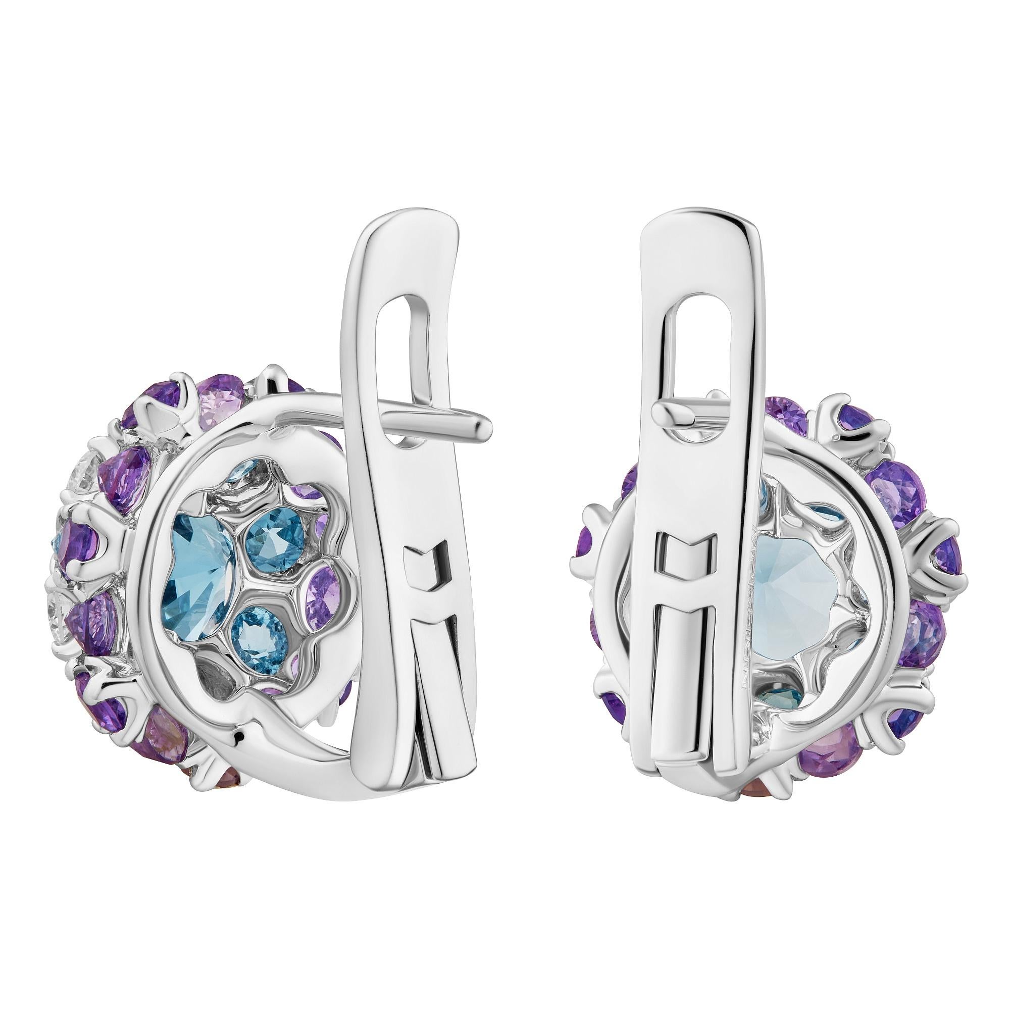 The combination of blue sky topaz, graceful amethyst, and dazzling diamonds are used in the MOISEIKIN's Aurora collection, elaborating with a creative approach of an upside-down setting. Strictly selected precise stones reflect the light, creating a