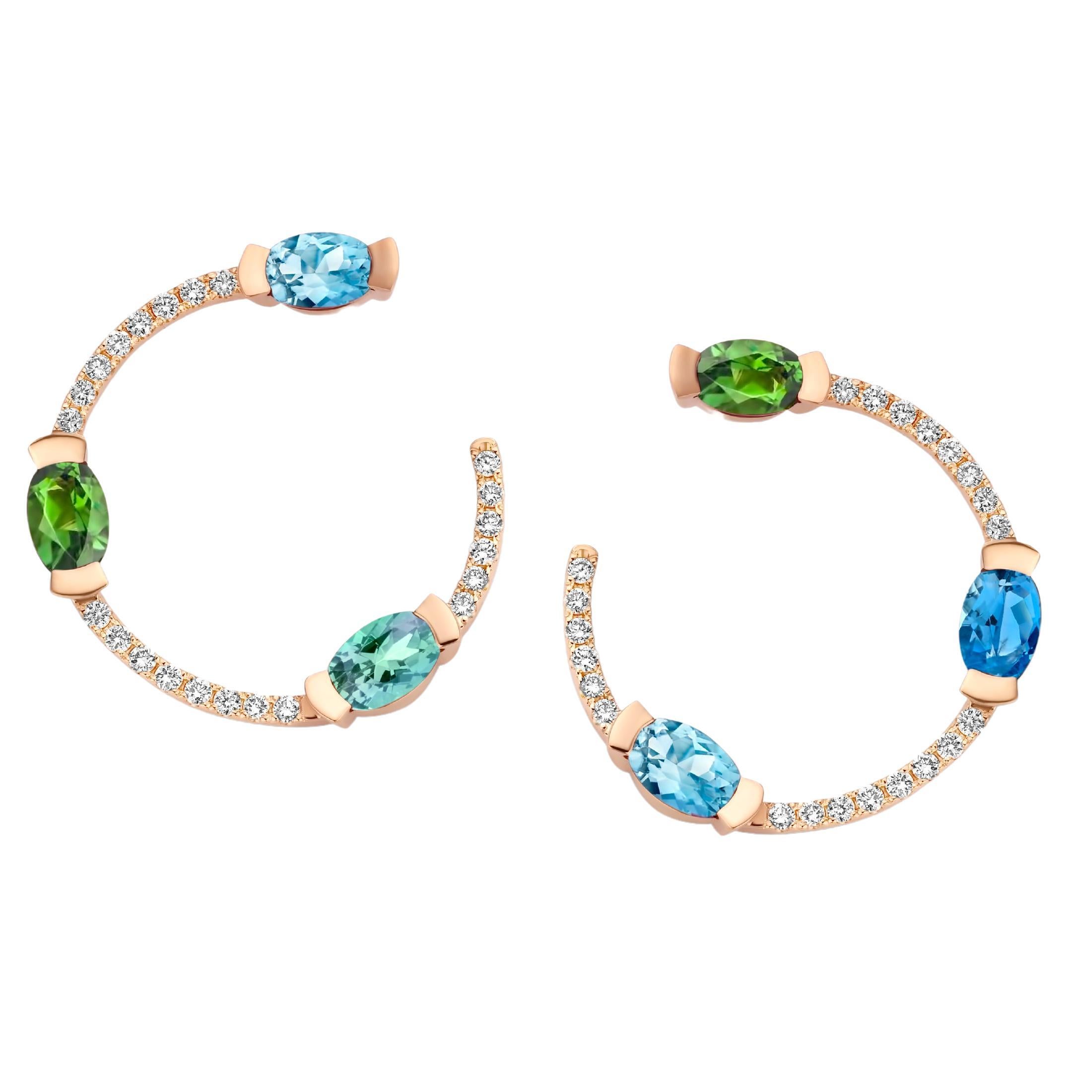 ADELINE trio curved earrings in 18Kt white gold set with an oval-shaped Aquamarine, an oval-shaped Green Tourmaline, an oval-shaped Mint Tourmaline, an oval-shaped Santa Maria Aquamarine and 0,44 Ct of white brilliant cut diamonds - VS F quality.