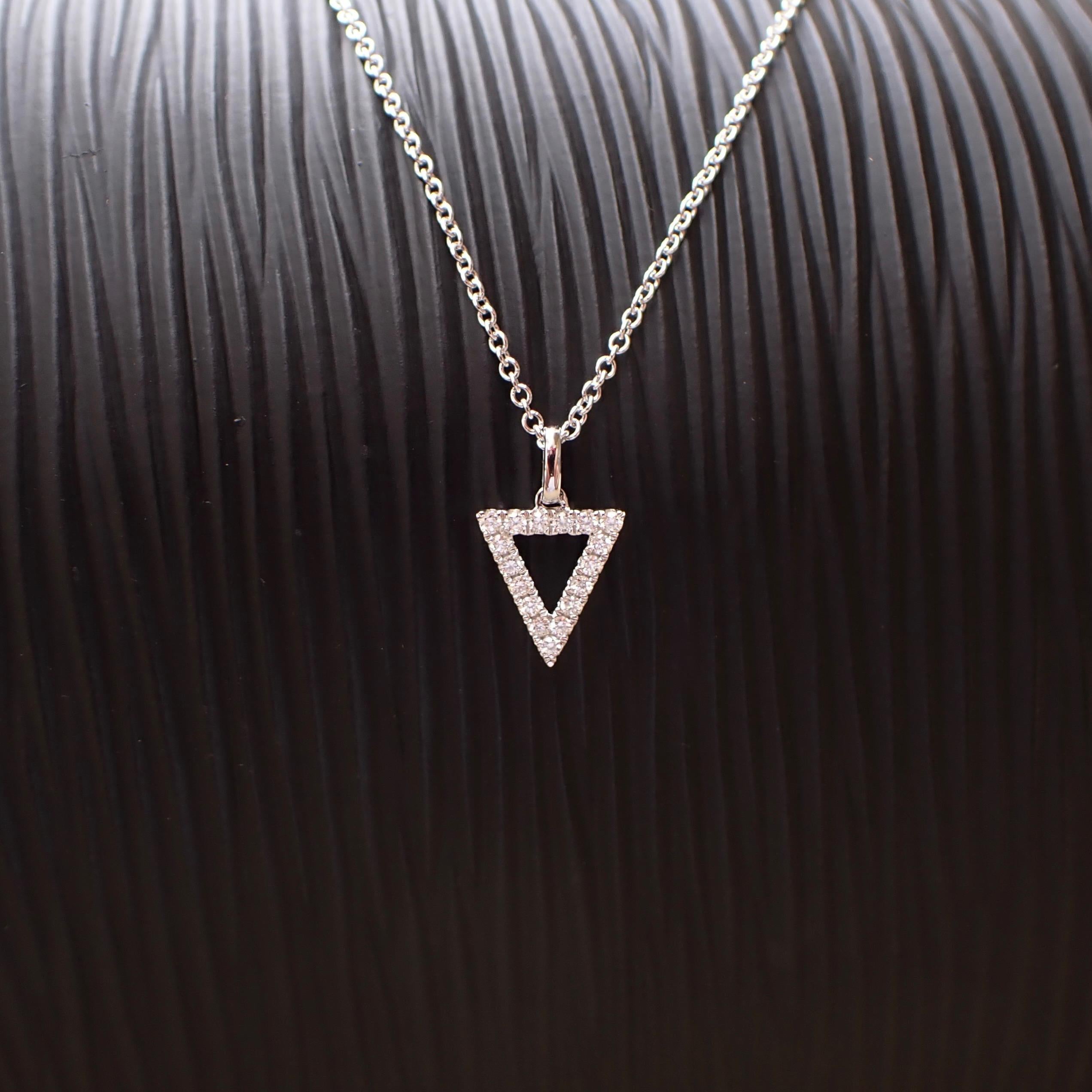 18k White Gold Triangle Pendant 0.15 carat Diamond hangs from a 16