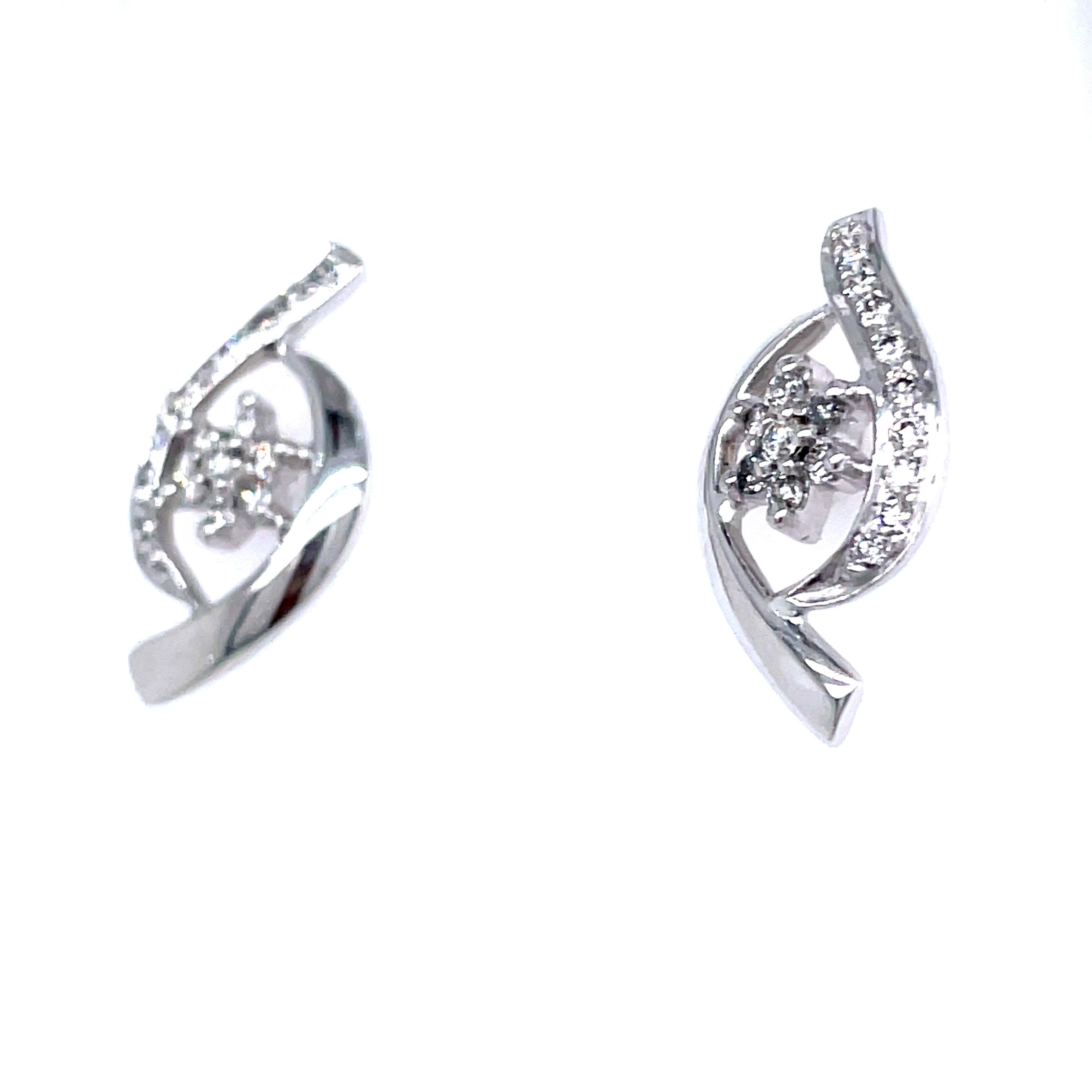 Women's 18k White Gold Twist Design Earrings With Diamonds For Sale