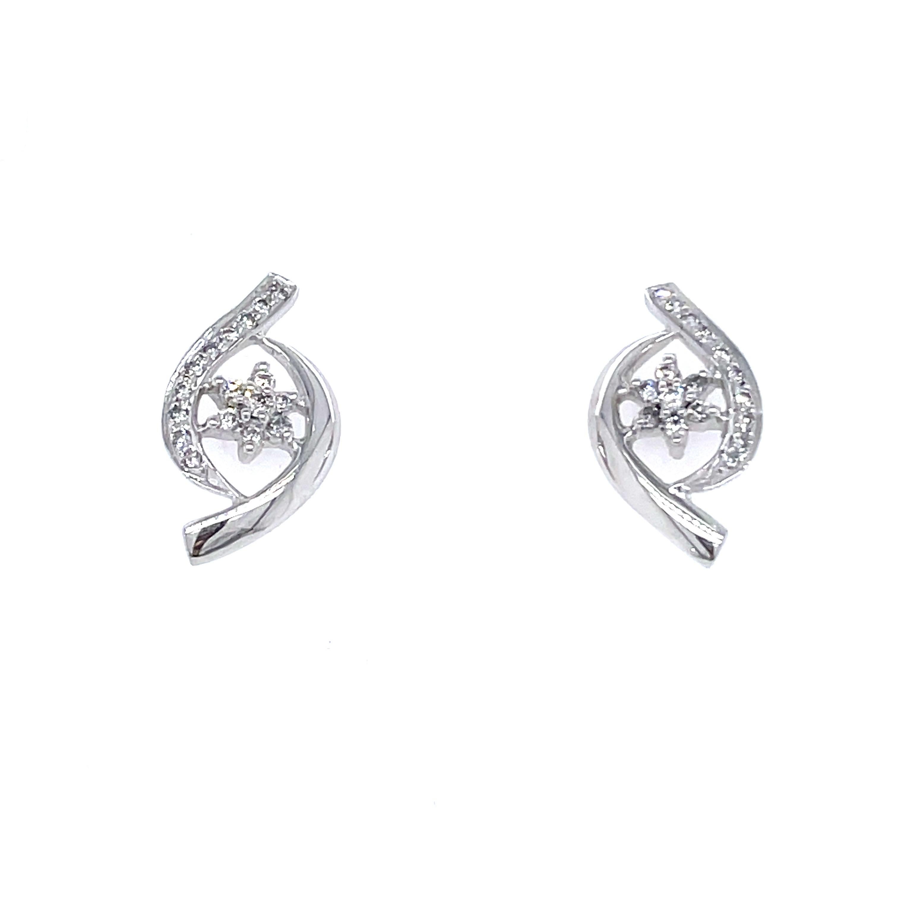 18k White Gold Twist Design Earrings With Diamonds For Sale 1