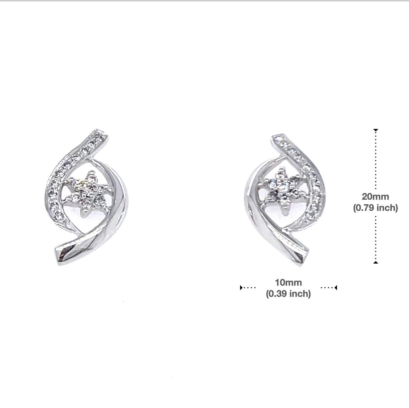 18k White Gold Twist Design Earrings With Diamonds For Sale 3