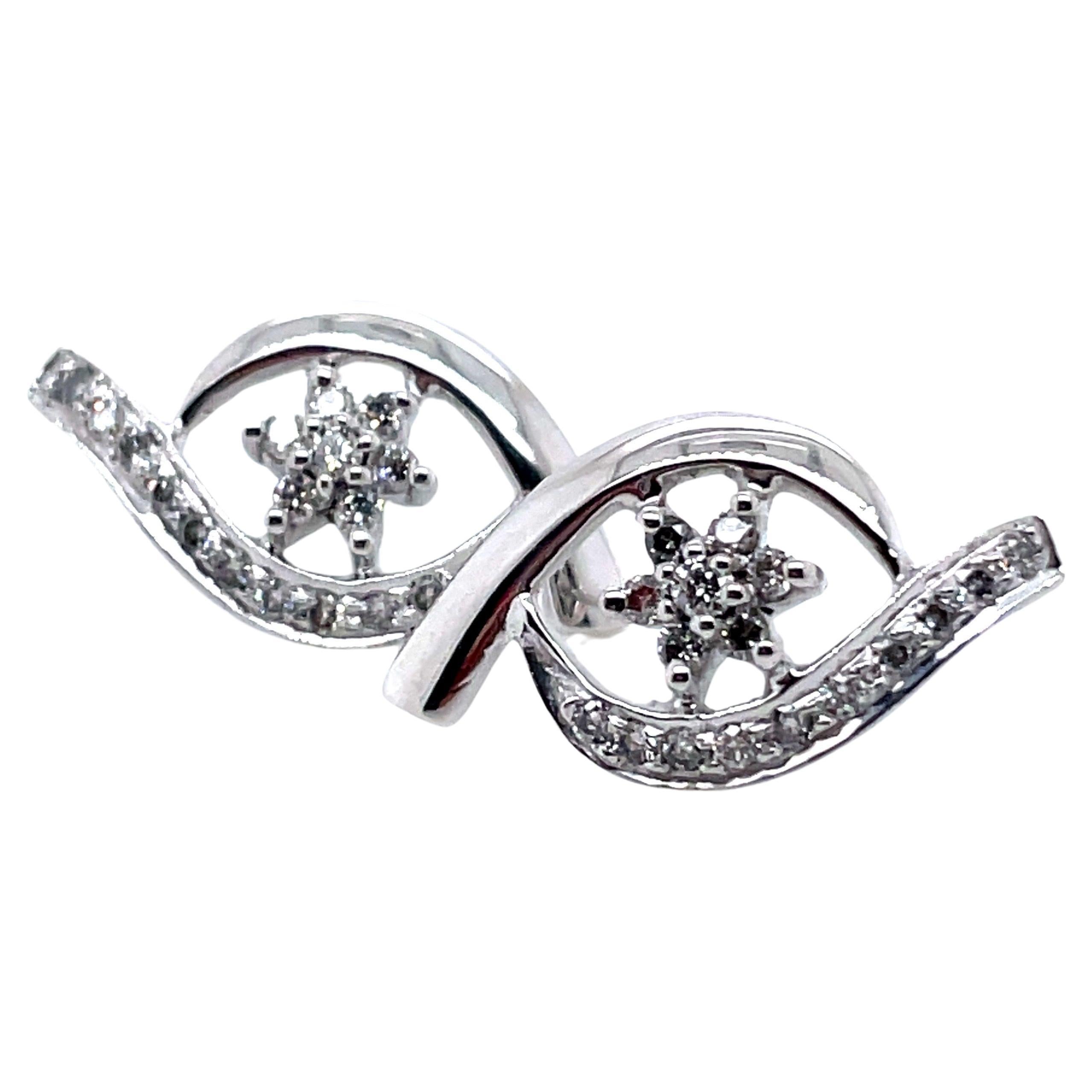 18k White Gold Twist Design Earrings With Diamonds For Sale