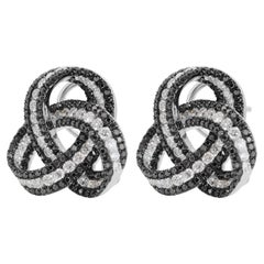 Orecchini con nodo a spirale in oro bianco 18k con 3,85 carati di diamanti naturali