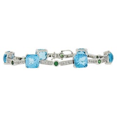 18k White Gold Vibrant Cushion Blue Topaz Tsavorite & Diamond Line Bracelet