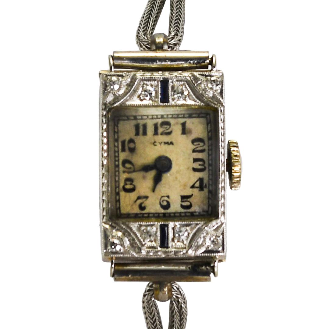 Orologio Cyma vintage in oro bianco 18 carati con diamanti e zaffiri