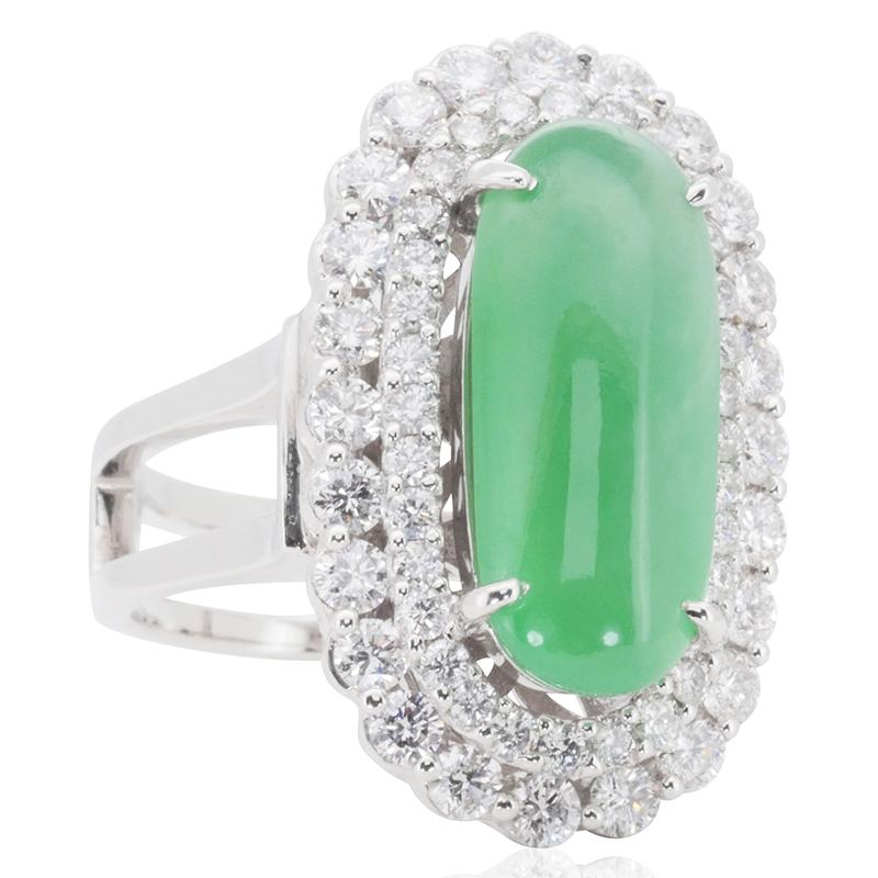 A beautiful unique dome ring with a dazzling 1 carat radiant natural Jade. It has 1.18 carat of side diamonds which add more to its elegance. The jewelry is made of 18k white gold with a high quality polish. It comes with a fancy jewelry box.

1