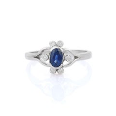 Solid 18k White Gold Vivid Oval Blue Sapphire and Diamond Wedding Ring