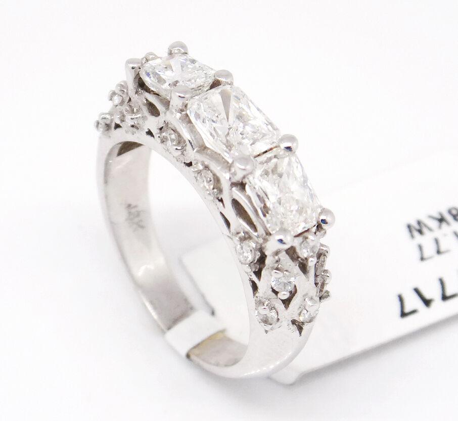 18 Karat White Gold VS1, 1.77 Carat Three-Stone Radiant Cut Diamonds Ring In New Condition For Sale In New York, NY
