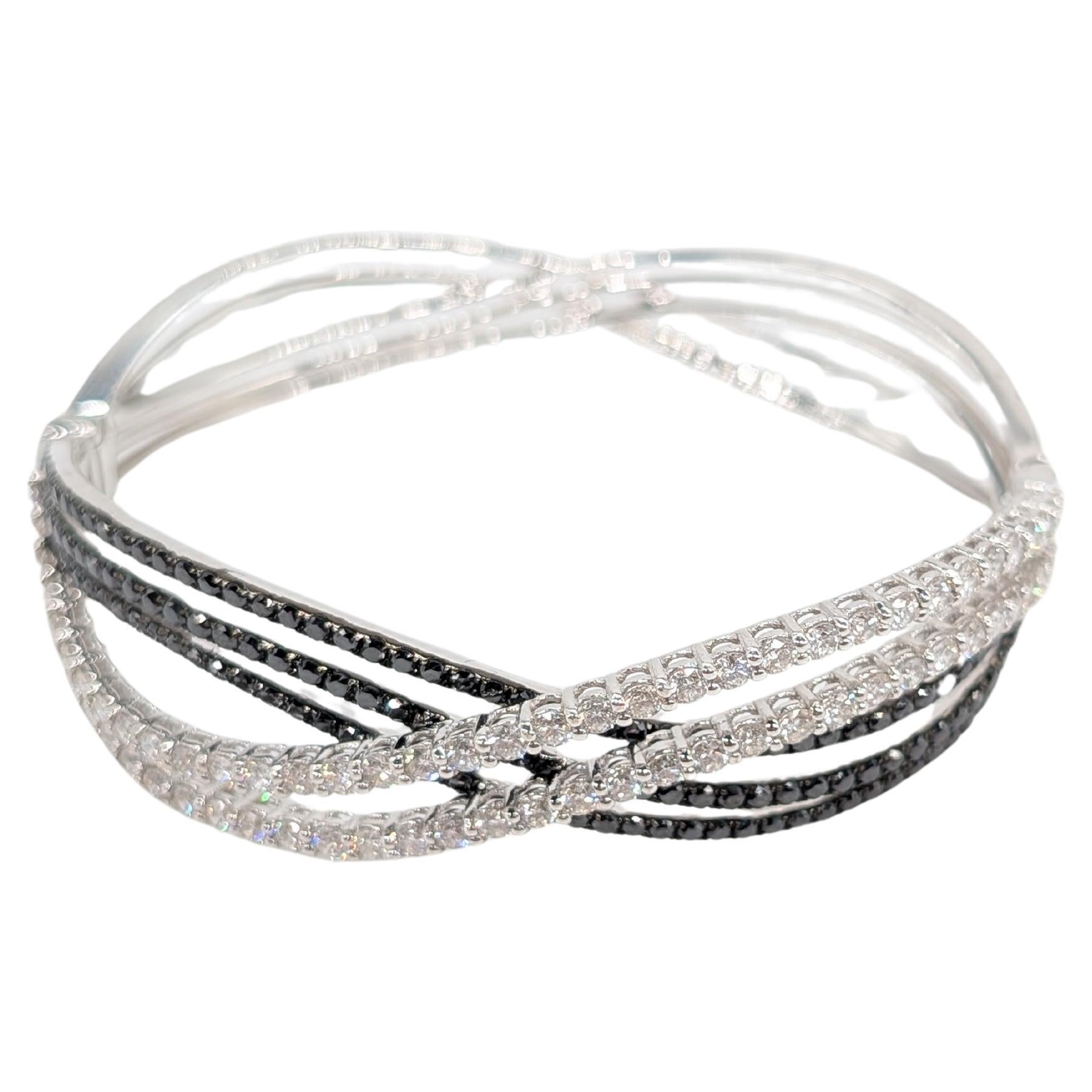 18k White Gold Wave Bangle with Brilliant Cut Round Black and White Diamonds