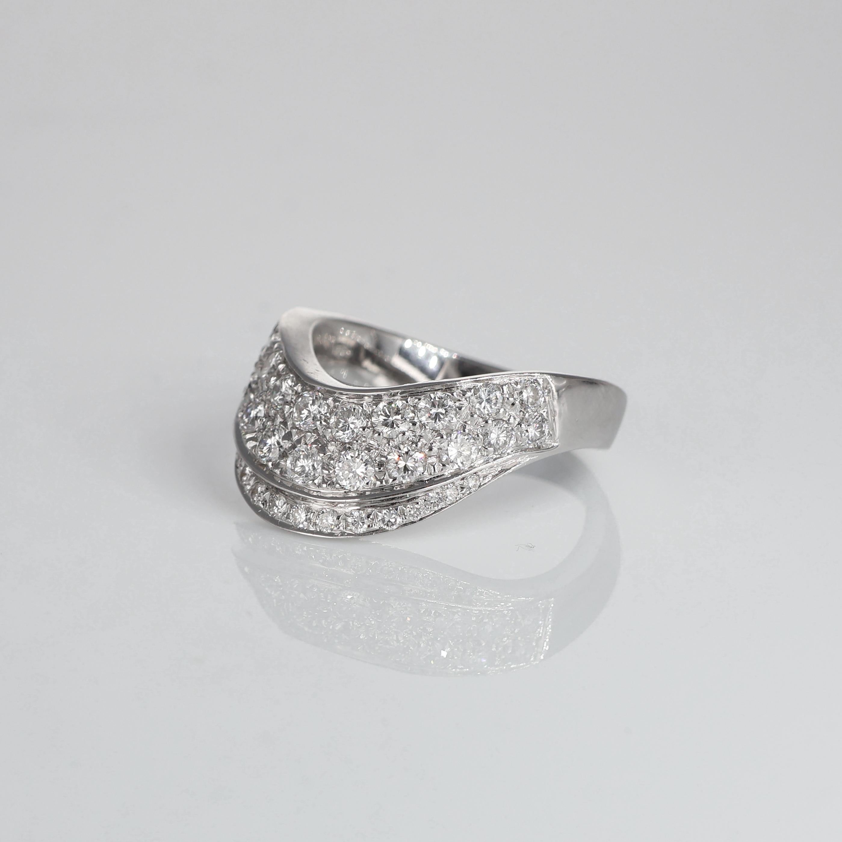 IMPORTANT NOTE:
✔ No additional costs will be added to this order.
✔ Shipping and customs duties are fully covered by us.
--------------------
This elegant 18K white gold ring features a stunning wave design, accentuated by a wide band adorned with
