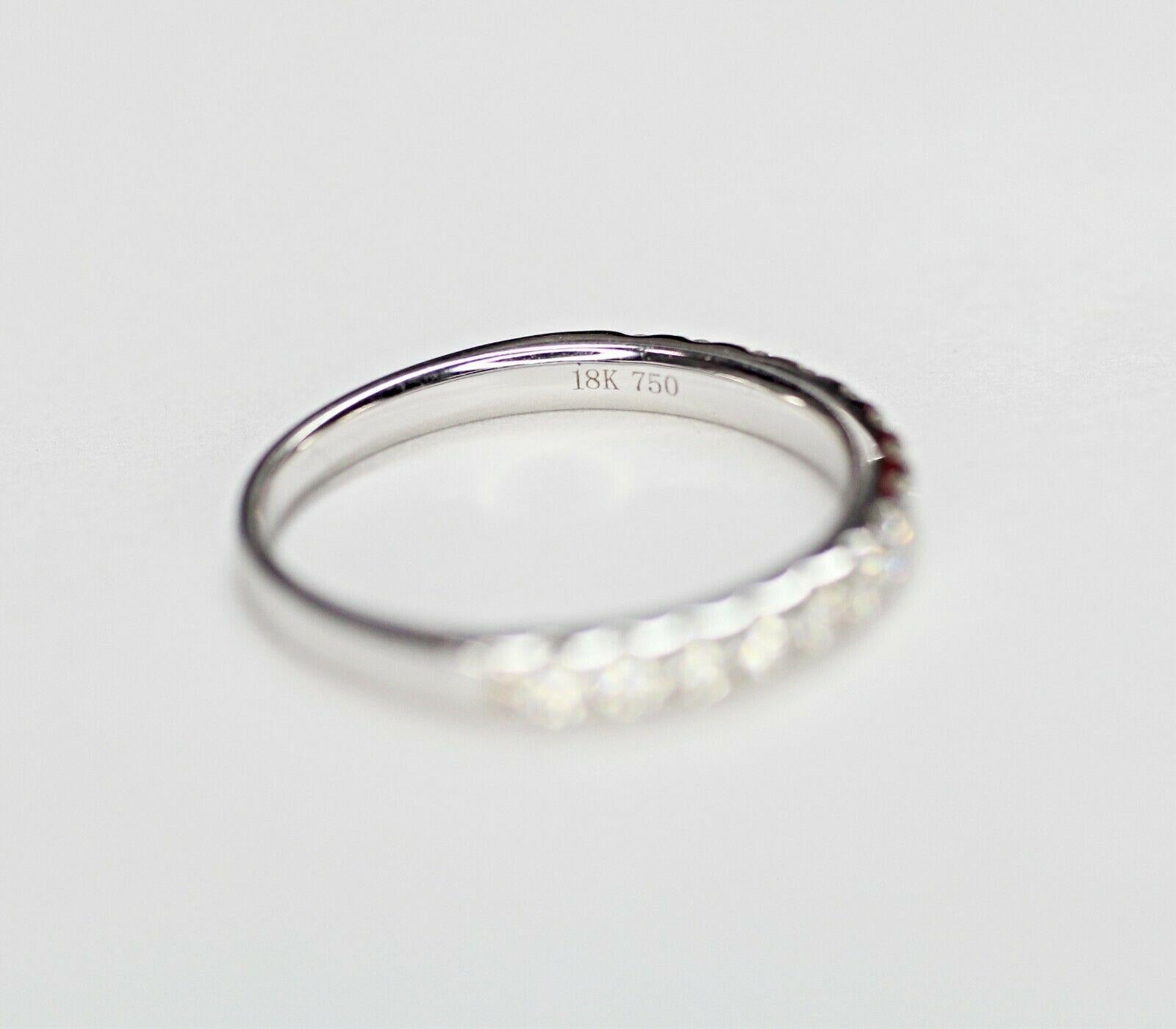 Contemporary 18 Karat White Gold Wedding Band Ring with Diamonds For Sale