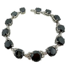 Bracelet en or blanc 18 carats avec diamants blancs et noirs