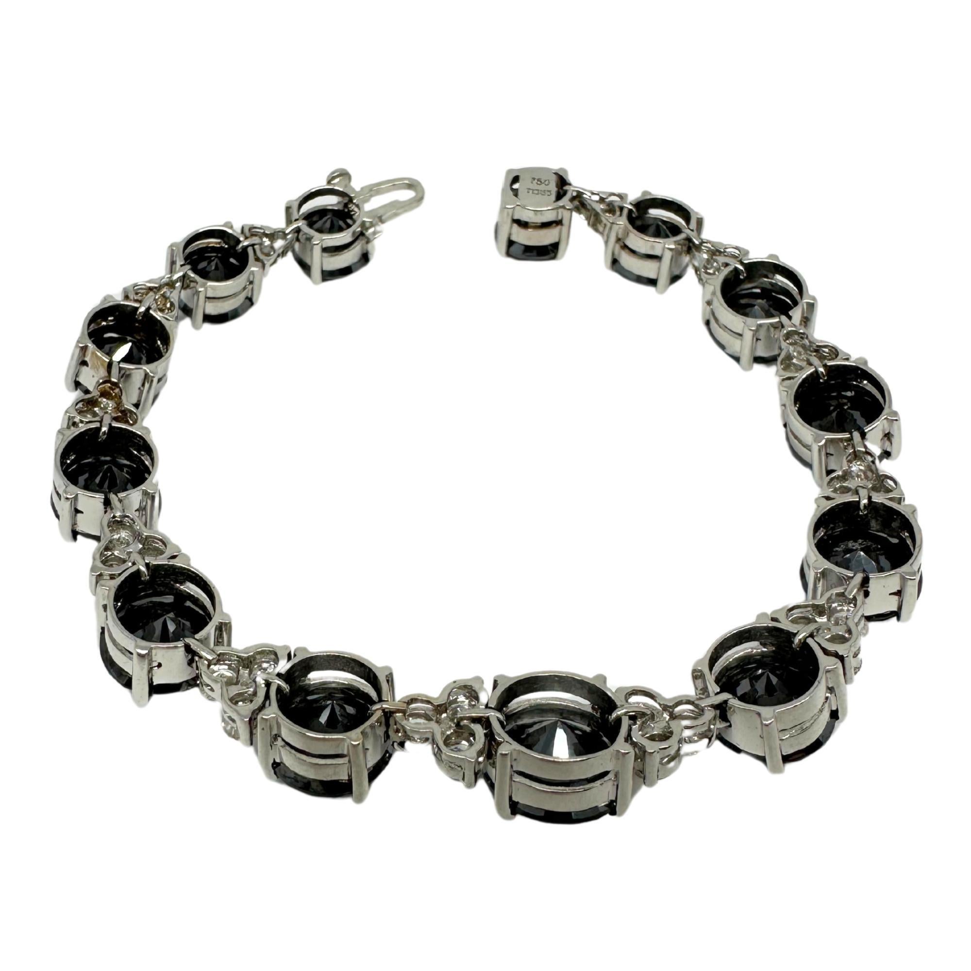 Women's 18k White Gold White and Black Diamond Bracelet For Sale