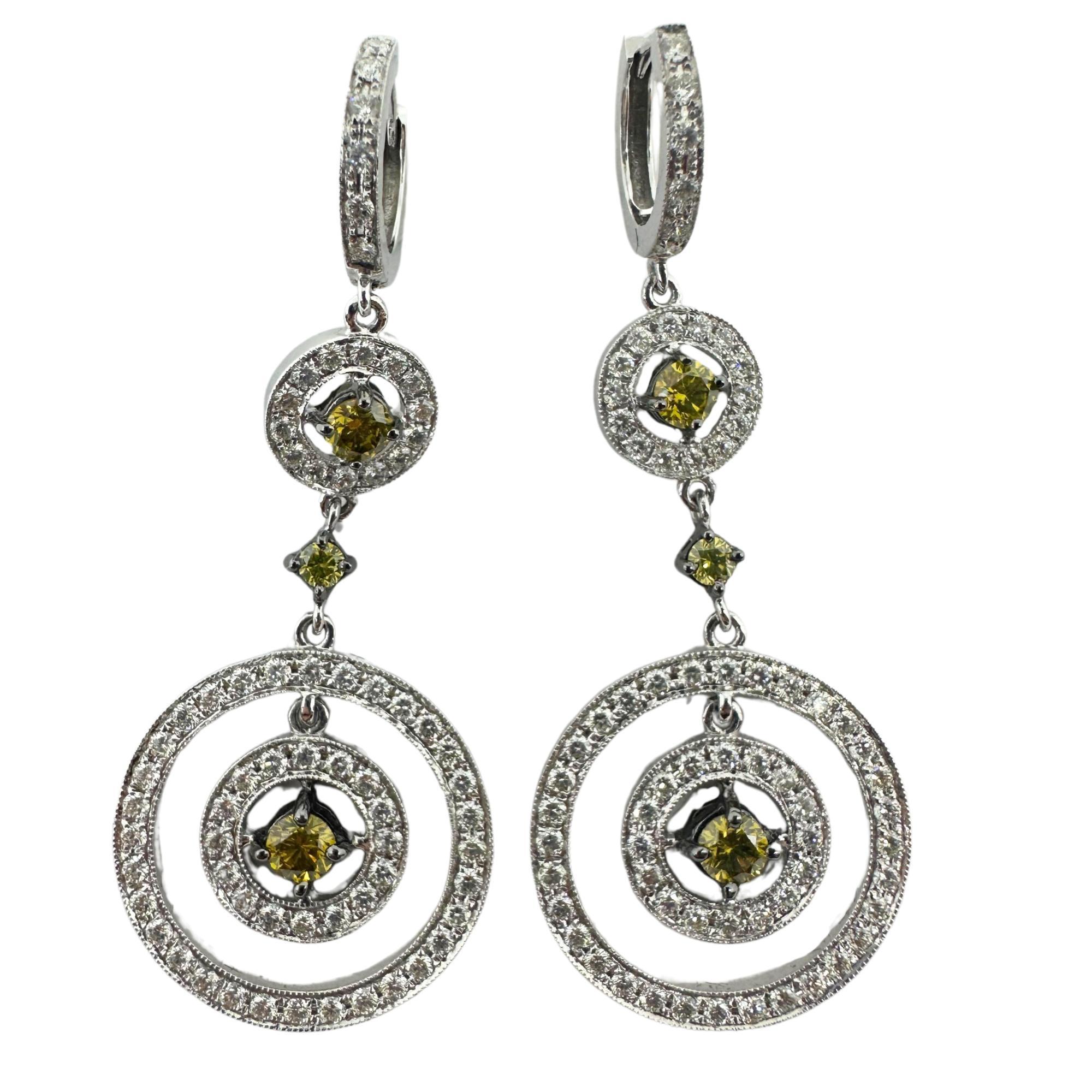 18K White Gold White and Yellow Diamond Drop Earrings
Condition: In good condition with some minor surface wear consistent with age.
Length: 1.75 inches
Width: 0.75 inches
Markings: 