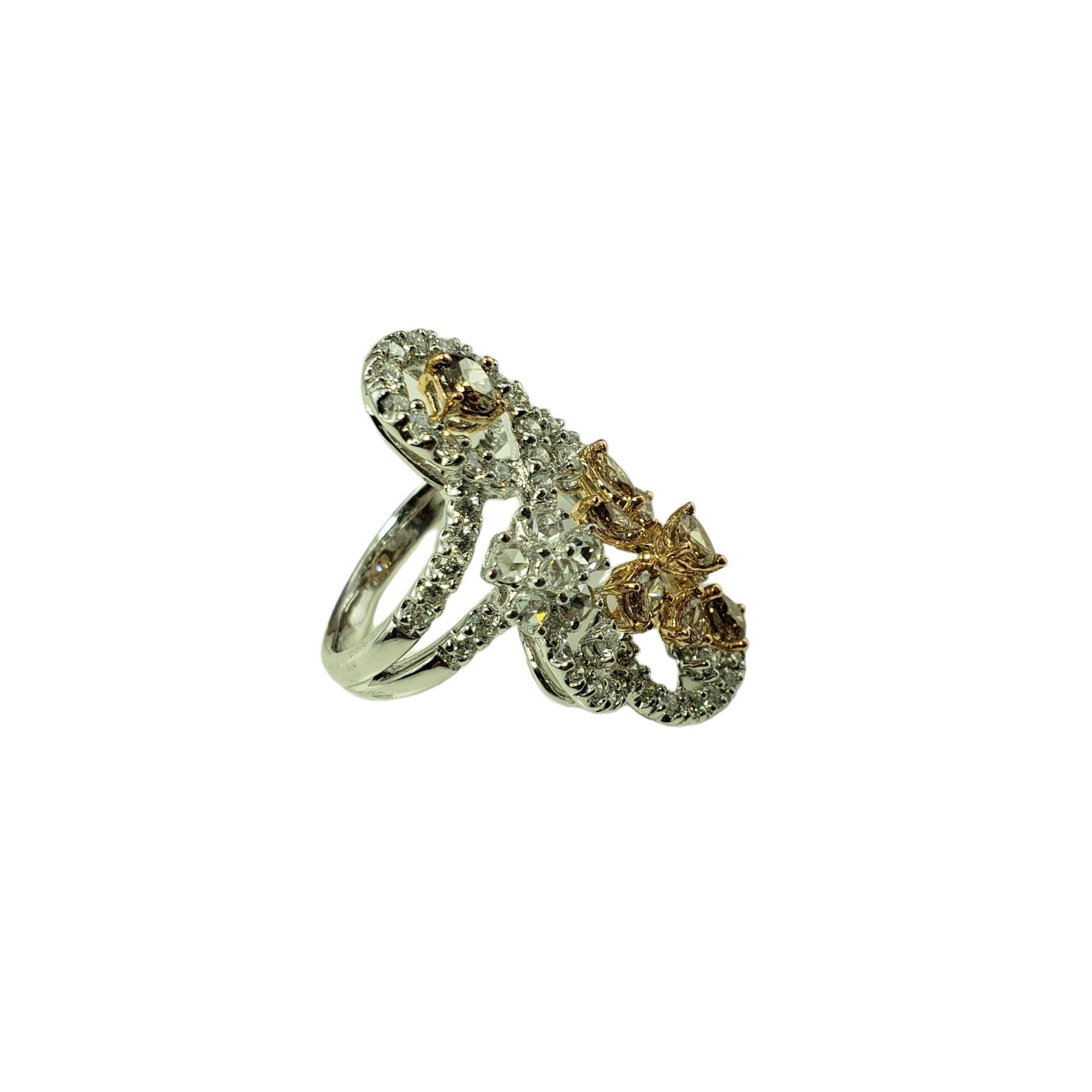 Vintage 18 Karat White Gold White and Champagne Diamond Ring Size 6.5 JAGi Certified-

This sparkling ring features 62 round brilliant cut diamonds and oval, marquis, rose and pear cut champagne diamonds set in beautifully crafted 18K white gold. 