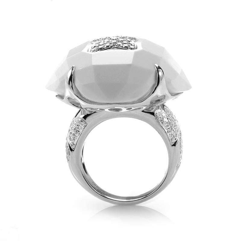 This ring is opulent and shines with diamonds. The setting is made of 18K white gold and is set with diamonds. Lastly, the ring boasts a lovely faceted white onyx stone. 
Ring Size: 6.75