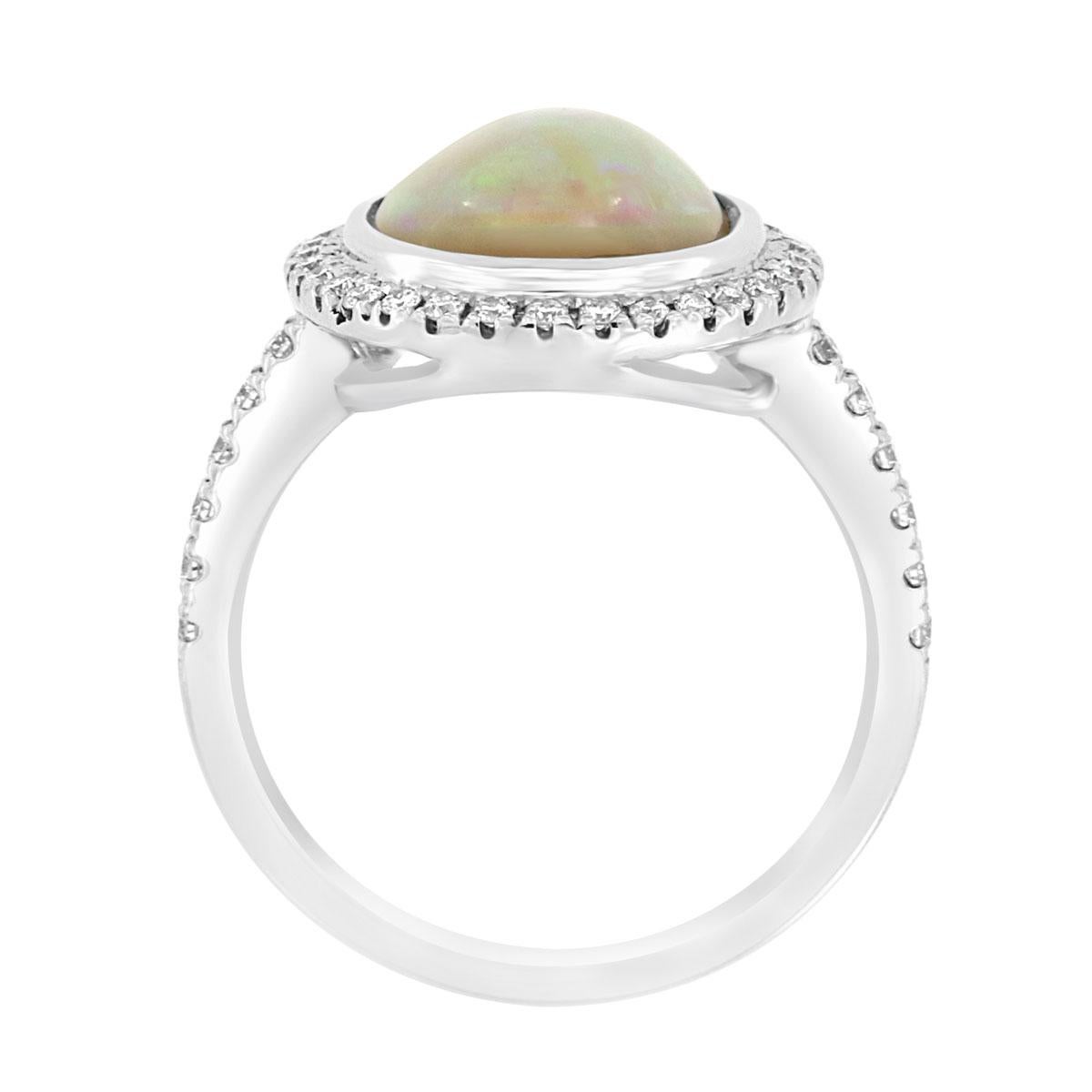 This colorful opal and diamond ring features an oval opal framed by Micro prong round brilliant diamonds in 18k white gold. Experience the Difference!

Product details: 

Center Gemstone Type: Opal
Center Gemstone Carat Weight: 2.26
Center Gemstone