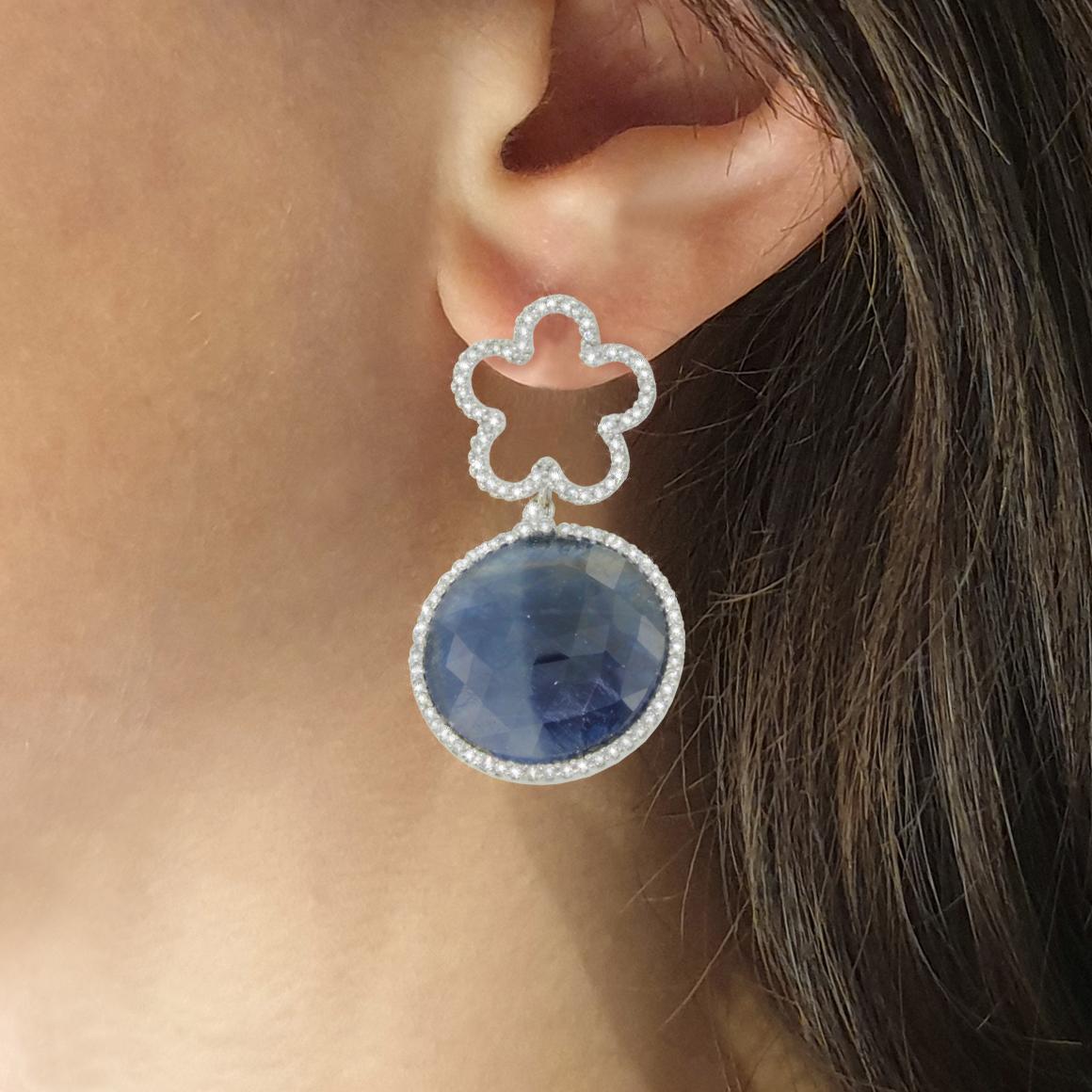  Jewels inspired by the world of nature. Diamond flowers that illuminates the face, Very elegant earrings with Blue Sappire and white diamonds made in Italy by Stanoppi Jewellery since 1948.

Earrings in 18k white gold with Blue Sapphire (round cut,