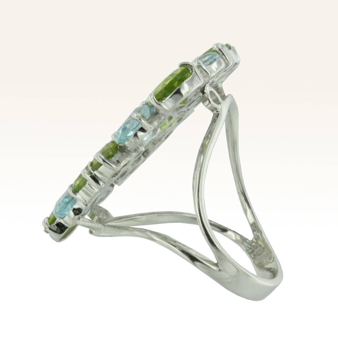 Modern 18 Karat White Gold with Blue Topaz and Peridot Ring