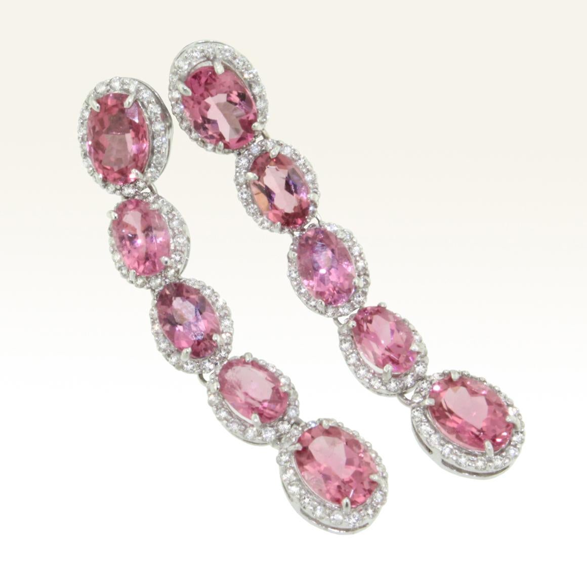Earrings in 18k white gold with pink Tourmaline (oval cut, size: 4x6 mm and 5x7 mm cts 6,90) and white Diamonds ct 0.80 VS colour G/H.   
Even the simplest of outfits can be transformed with the right accessories! With amazing earrings made in Italy