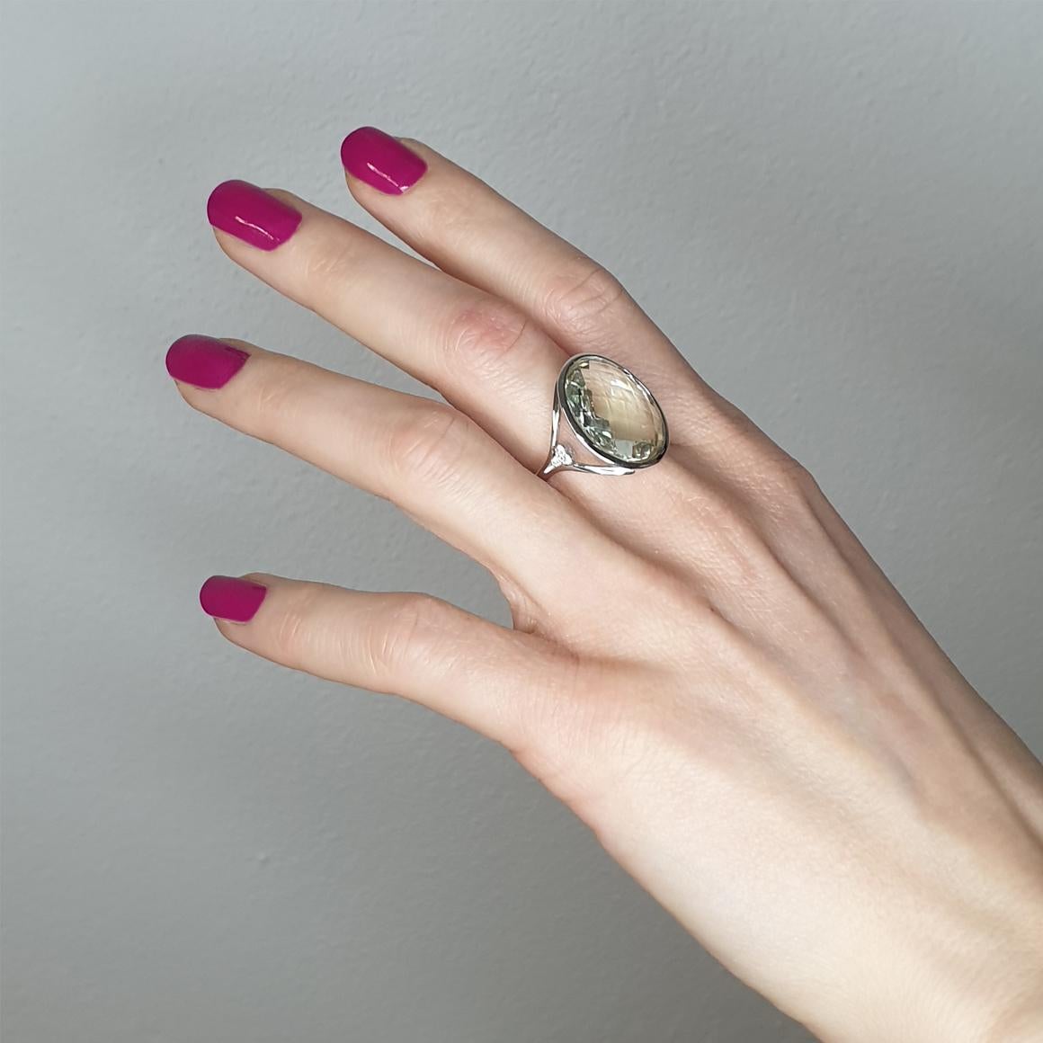 Light colour for this elegant ring in white gold with special green Amethyst (Prasiolite) handmade in Italy by Stanoppi Jewellery since 1948.
Ring in 18k white gold with Prasiolite (oval cut, size: 15x20mm) and white Diamonds cts 0.06 VS colour G/H.