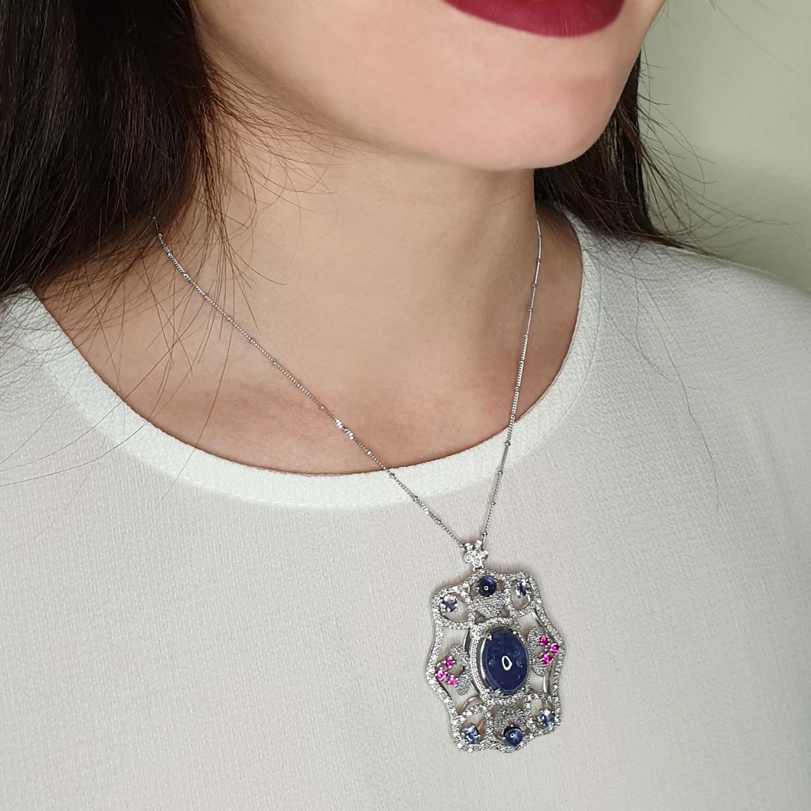 Timeless pendant unique and elegant made in Italy by Stanoppi Jewellery since 1948.
Pendant with chain in 18k white gold with Tanzanite (oval cabochon cut, size:12x15 mm; round cabochon cut, size:5 mm; round cut, size:4 mm), pink Tourmaline (round